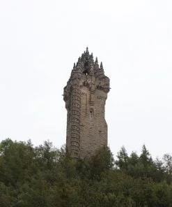 Above us, against a white sky and on top of a wooded hill is a large ornate tower dating from the mid-1800s. This Wallace Monument, on the Stirling Castle Tour, is four floors high.