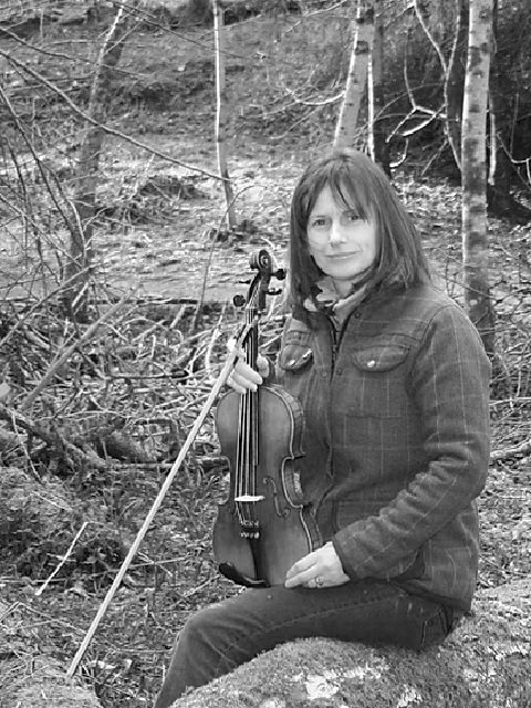 Inverness Tours Guide - Irene Fraser taking her music with her to the forest